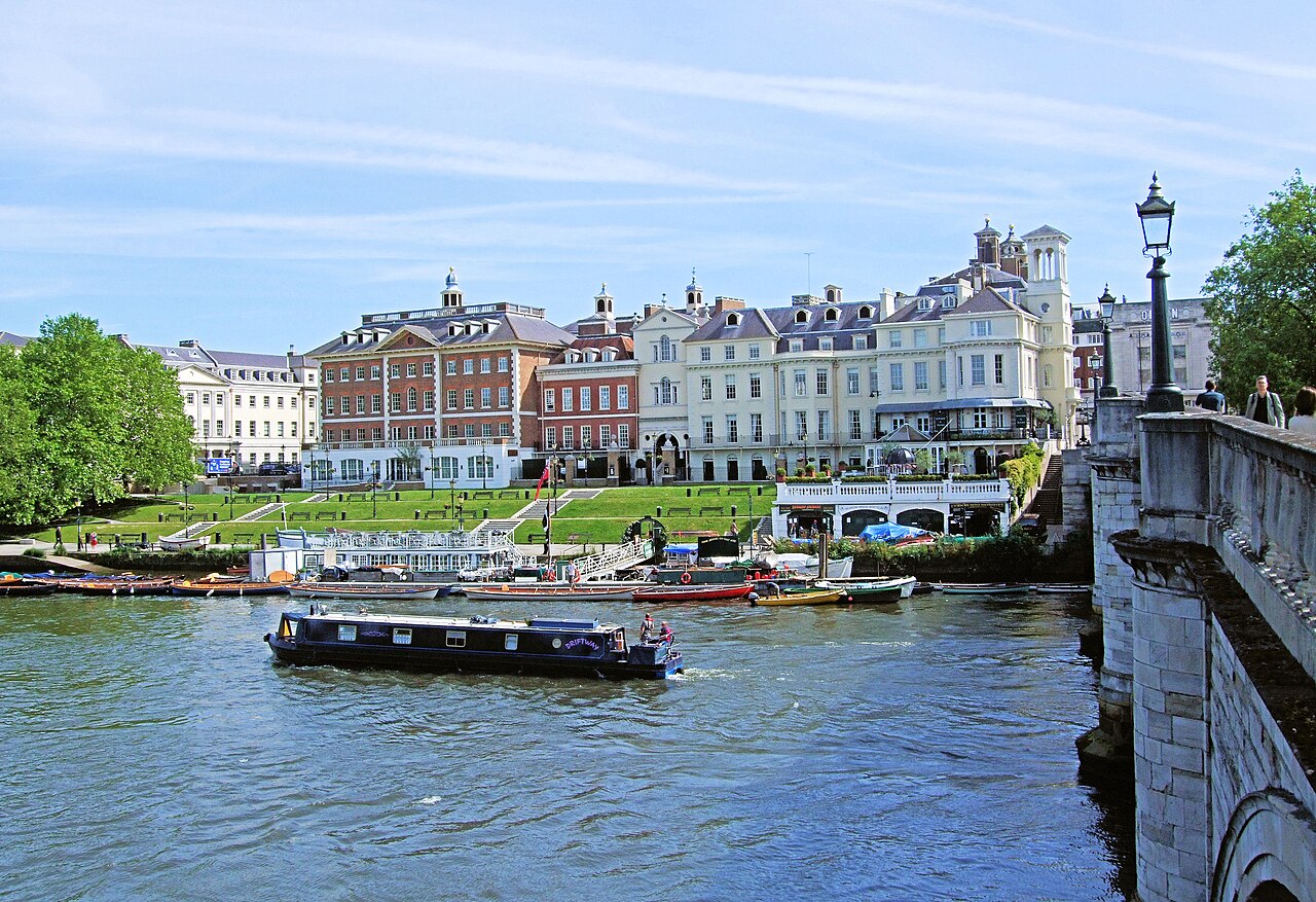Boats on the Thames beside Richmond riverside and Richmond Bridge